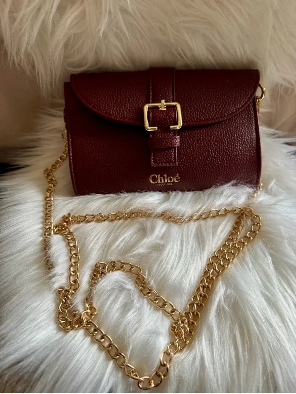 Chloé Parfums Burgundy Small clutch with Gold Buckle and pearl chain - Picture 1 of 5